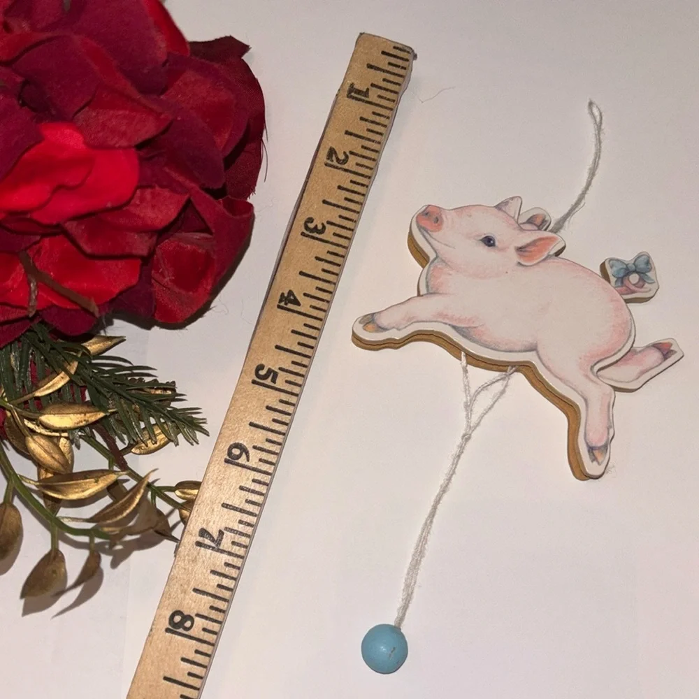 Flying Pig ornament Midwest Importers Canon Falls Wooden Pull String Toy